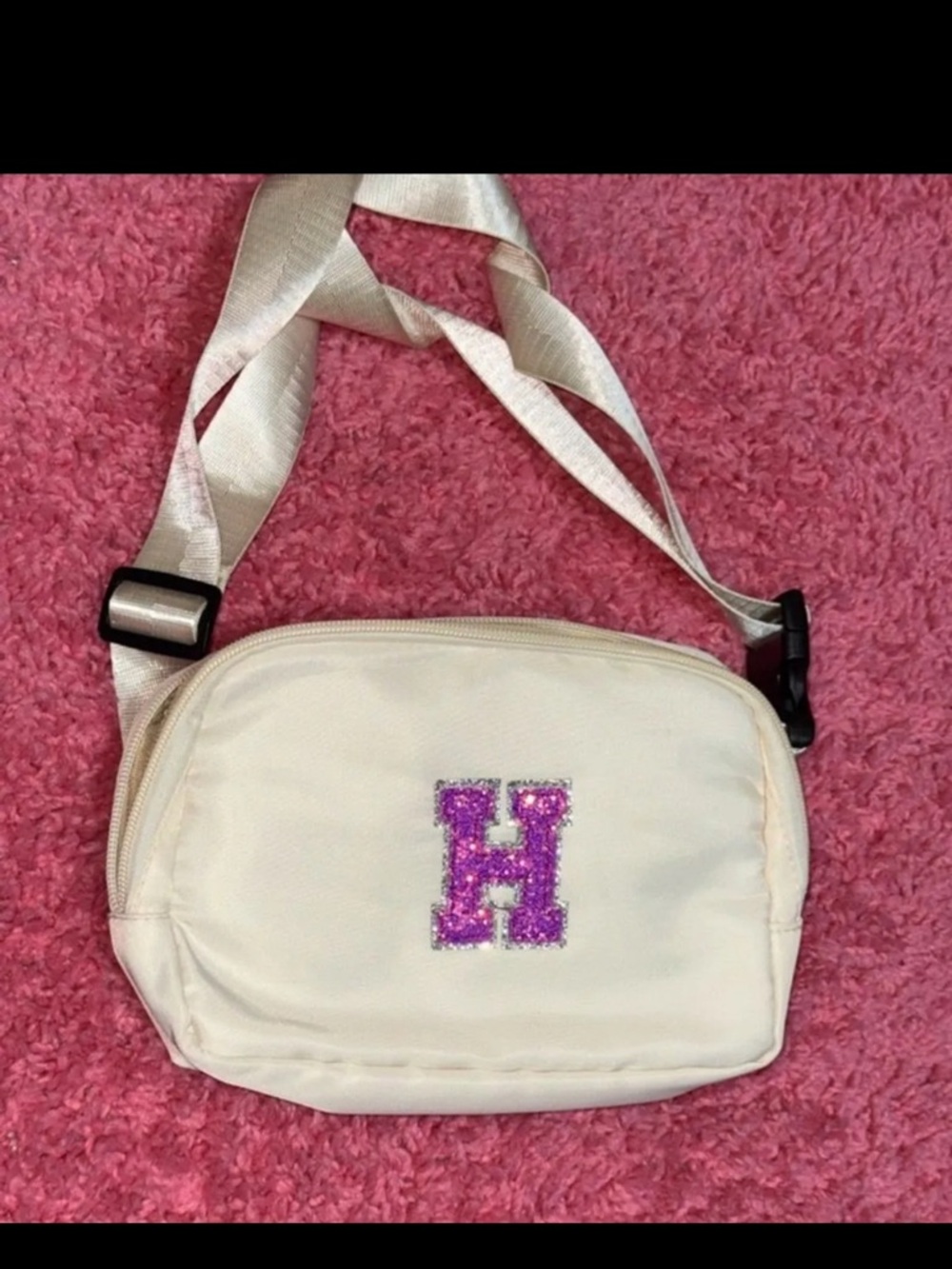 Amazon Cream Crossbody Bag with Purple Sequin H Accent